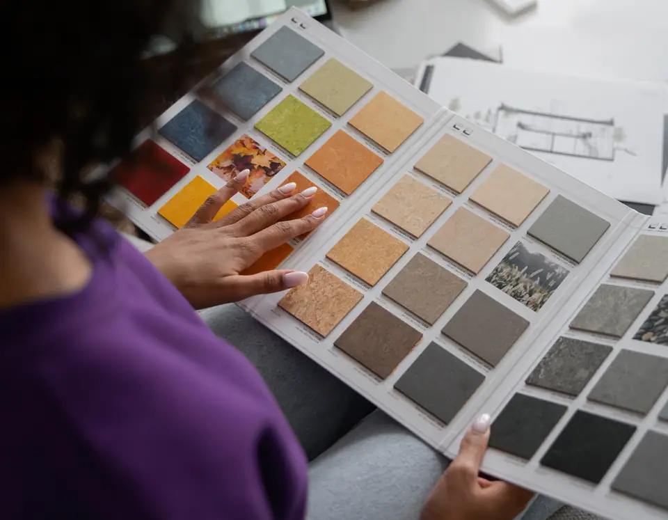 Design professionals sharing ideas around a table